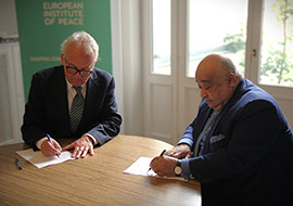 Sheikh Mohamed Bin Issa Al Jaber and Michael Keating signing the collaborative agreement