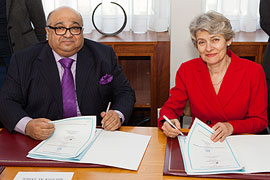 HE Sheikh Mohamed Bin Issa Al Jaber and UNESCO Director-General Mrs Irina Bokova sign an agreement to support the transition in Yemen through strengthening the education system