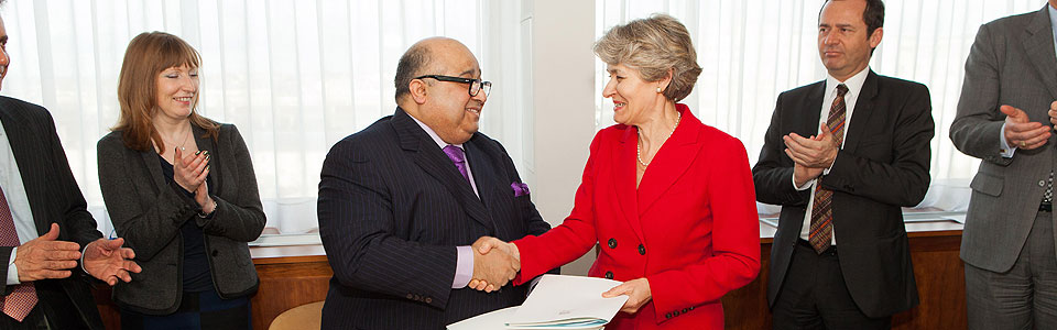 HE Sheikh Mohamed Bin Issa Al Jaber and UNESCO Director-General Mrs Irina Bokova sign an agreement at UNESCO Headquarters on 7 February 2013